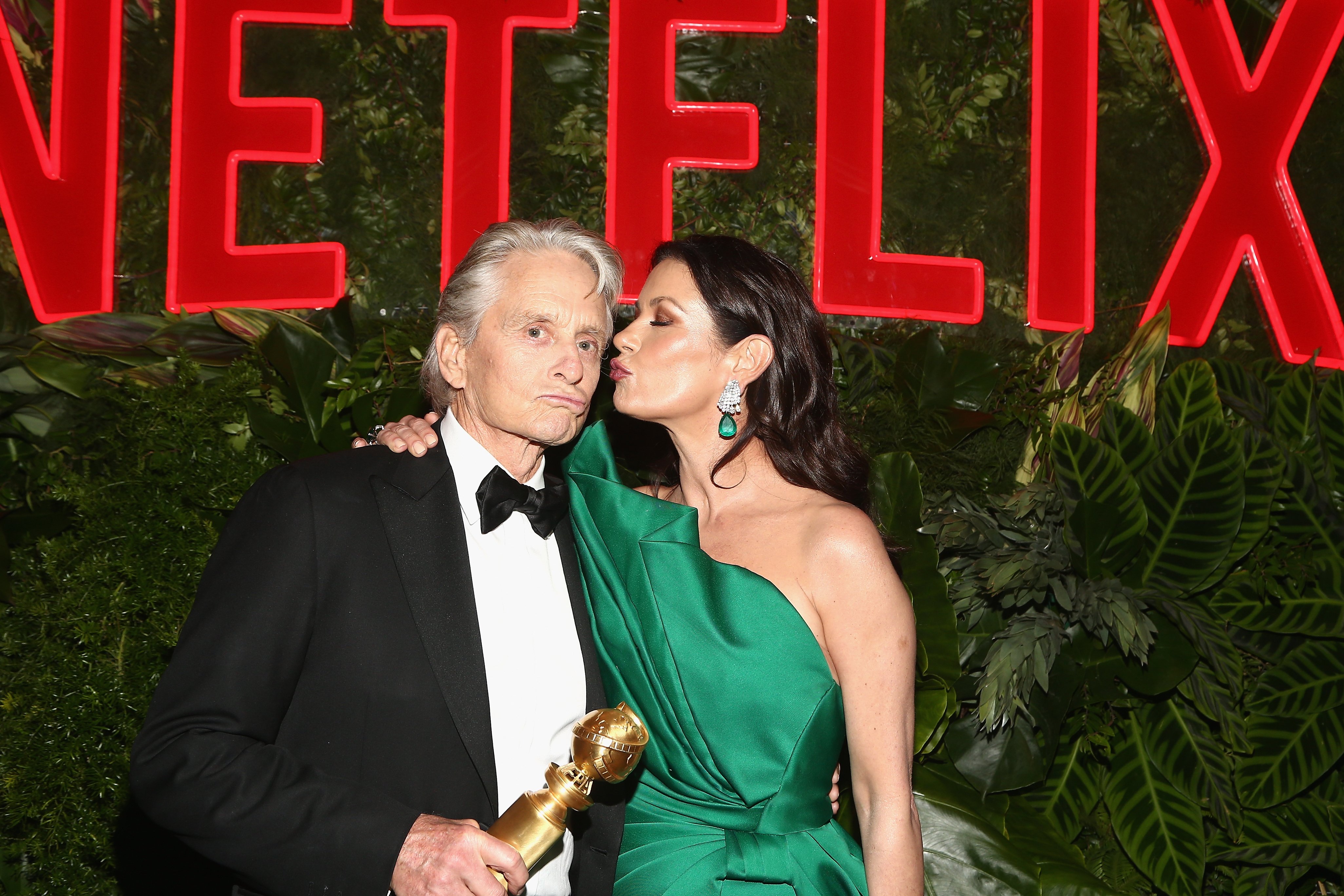 Image Credits: Getty Images / Tommaso Boddi | Michael Douglas (L) and Catherine Zeta-Jones attend the Netflix 2019 Golden Globes After Party on January 6, 2019 in Los Angeles, California.