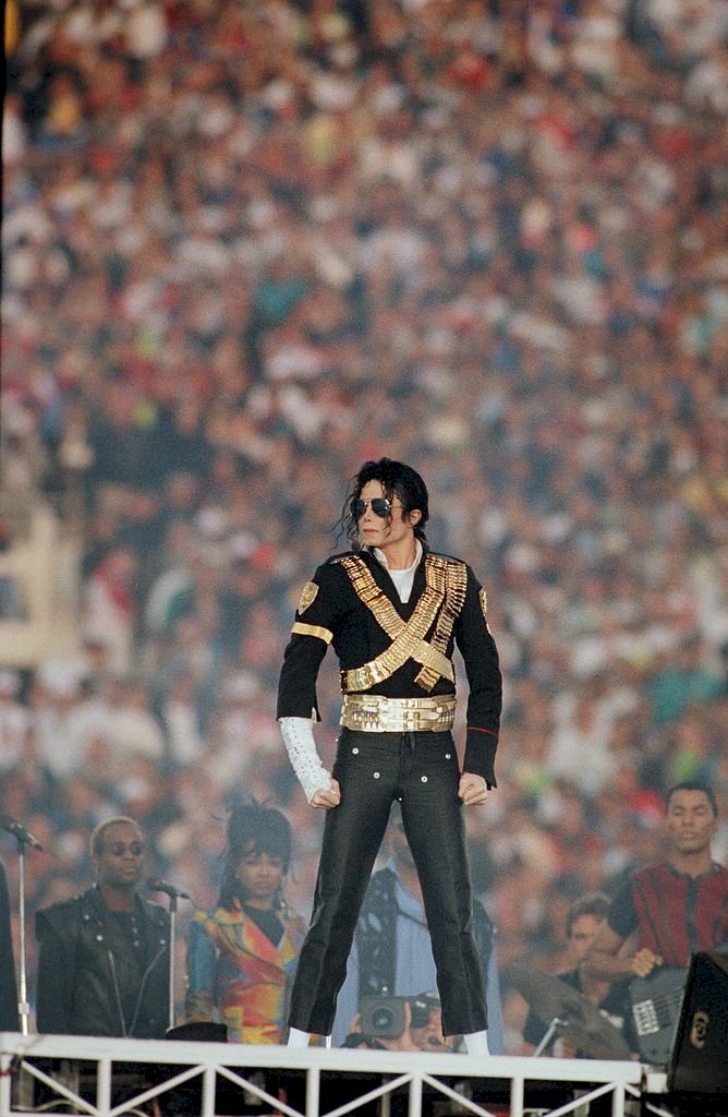 Image Credit: Getty Images / Michael Jackson performing on stage.