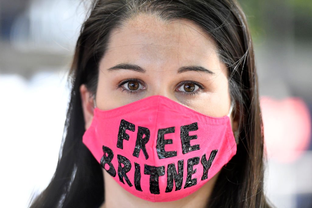 Image Credit: Getty Images / Leanne Simmons from Los Angeles gathers with supporters of Britney Spears outside a courthouse in downtown for a #FreeBritney protest as a hearing regarding Spears' conservatorship is in session on July 22, 2020. Image Credit: Getty Images / Leanne Simmons from Los Angeles gathers with supporters of Britney Spears outside a courthouse in downtown for a #FreeBritney protest as a hearing regarding Spears' conservatorship is in session on July 22, 2020.