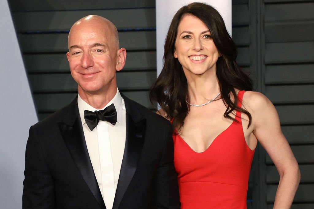 Image Credit: Getty Images / Amazon CEO Jeff Bezos (L) and MacKenzie Bezos attend the 2018 Vanity Fair Oscar Party on March 4, 2018 in Beverly Hills, California.