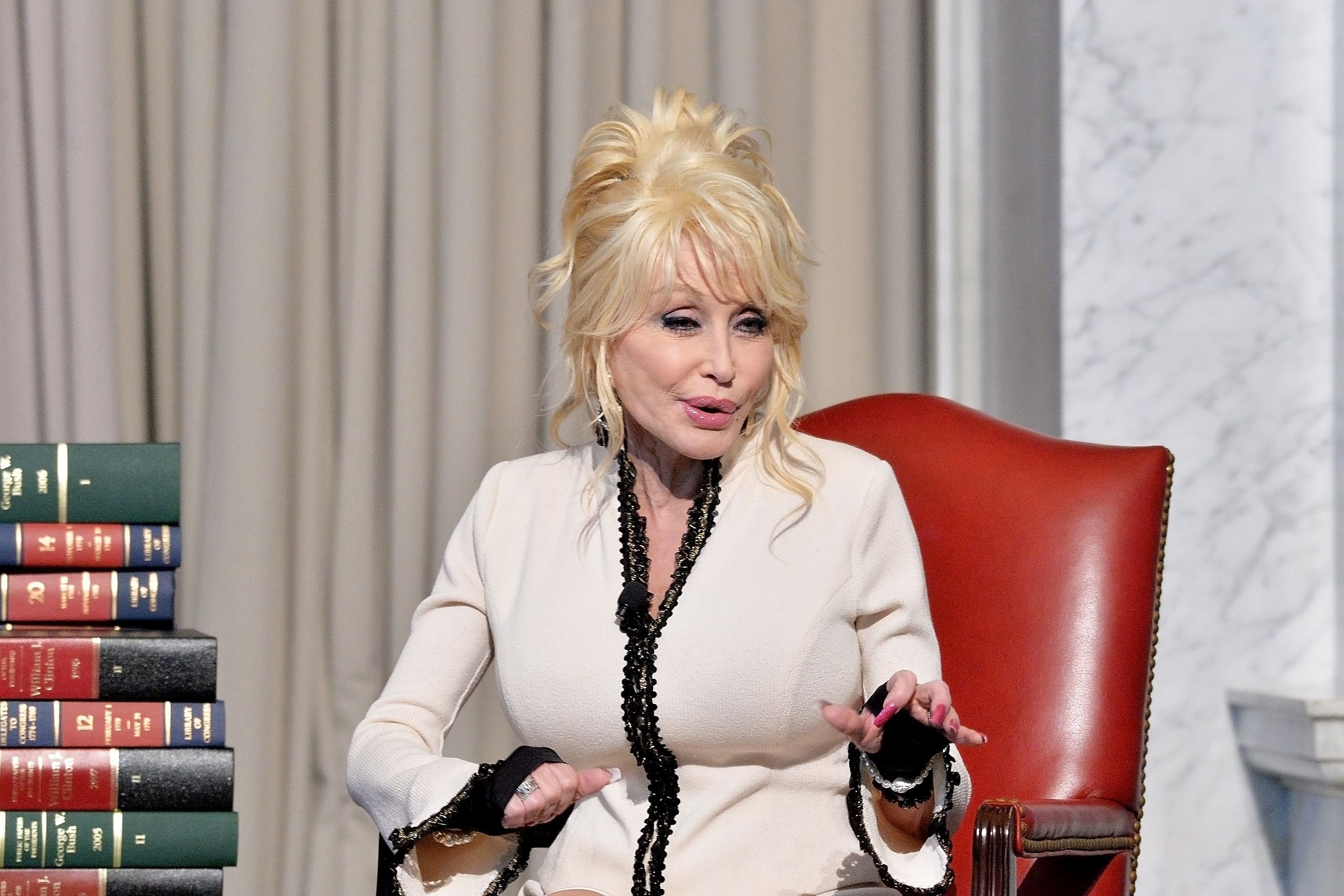 Image Credit: Getty Images / The icon, Dolly Parton during a talk.