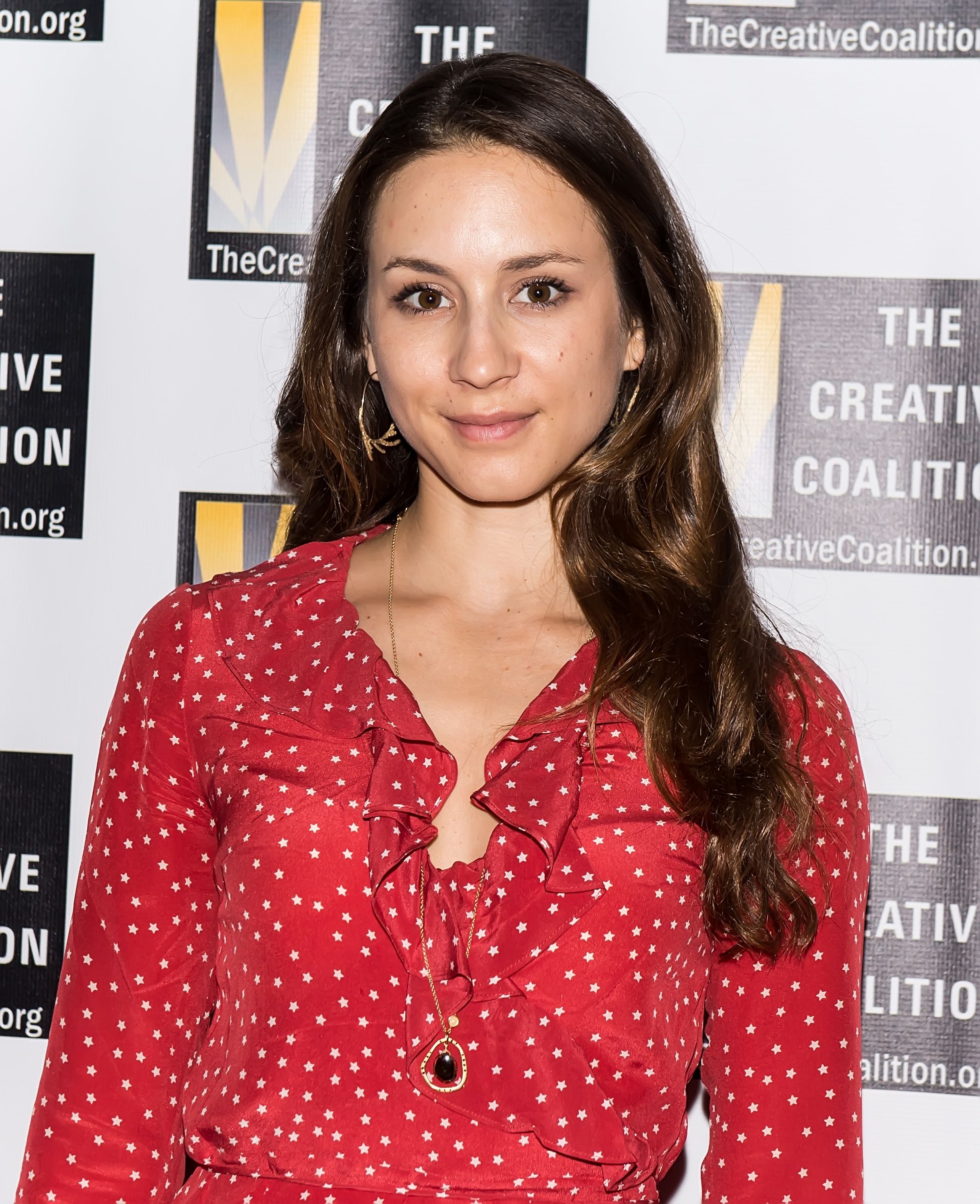 Troian Bellisario who portrayed Spencer Hastings on PLL / Getty Images