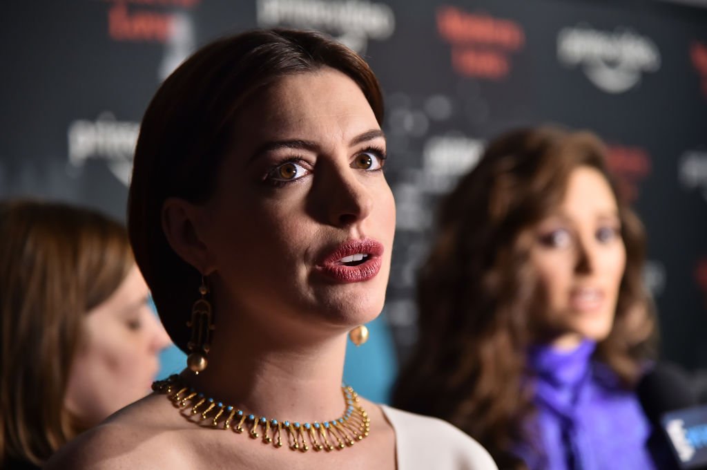 Image Credit: Getty Images / Anne Hathaway and Emmy Rossum attend Amazon's Museum Of Modern Love on October 10, 2019 in New York City.