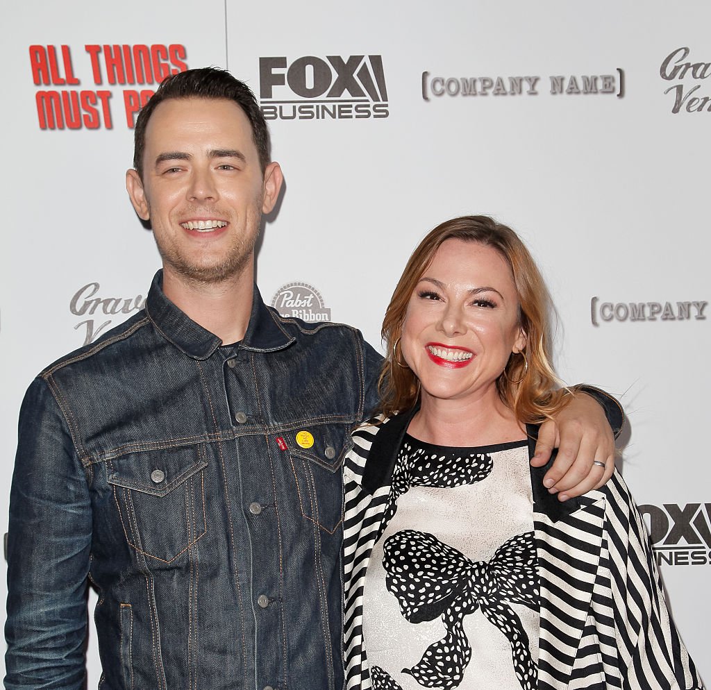 Image Credits: Getty Images / Tibrina Hobson / FilmMagic | Colin Hanks and Samantha Bryant attend the premiere of 'All Things Must Pass' at Harmony Gold Theatre on October 15, 2015 in Los Angeles, California.