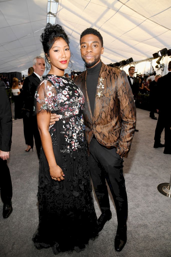 Image Credits: Getty Images / Taylor Simone Ledward and Chadwick Boseman at the 25th Annual Screen Actors Guild Award