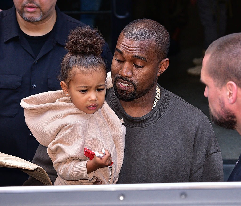 Image Credit: Getty Images / North West and Kanye West leave Kanye West Yeezy Season 2 New York Fashion Week show at Skylight Modern on September 16, 2015 in New York City.