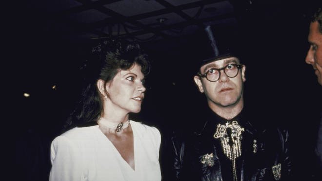 Image Credits: Getty Images / Elton John photographed with his former wife, Renate.