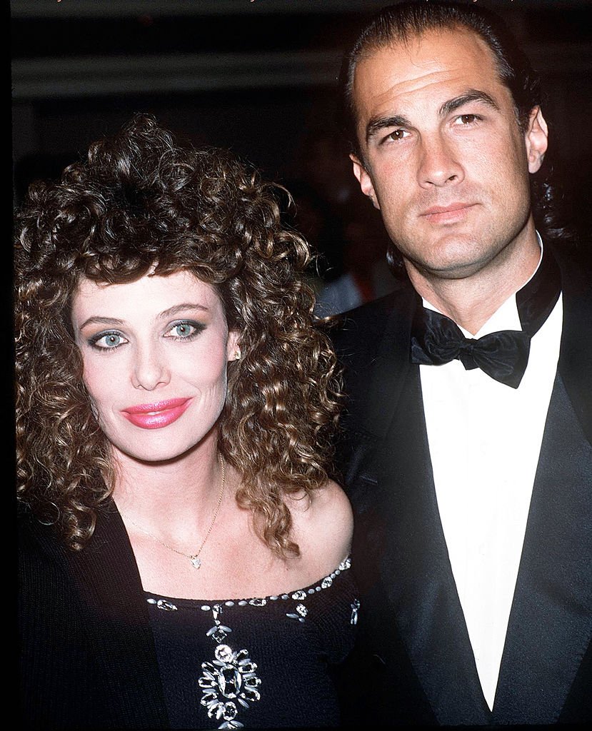 Image Credits: Getty Images / Kypros | Model Kelly LeBrock and her husband, actor Steven Seagal attend the 16th Annual American Film Institute Lifetime Achievement Awards Honoring Jack Lemmon on March 10, 1988 at the Beverly Hilton Hotel in Beverly Hills, California. Image Credits: Getty Images / Kypros | Model Kelly LeBrock and her husband, actor Steven Seagal attend the 16th Annual American Film Institute Lifetime Achievement Awards Honoring Jack Lemmon on March 10, 1988 at the Beverly Hilton Hotel in Beverly Hills, California.