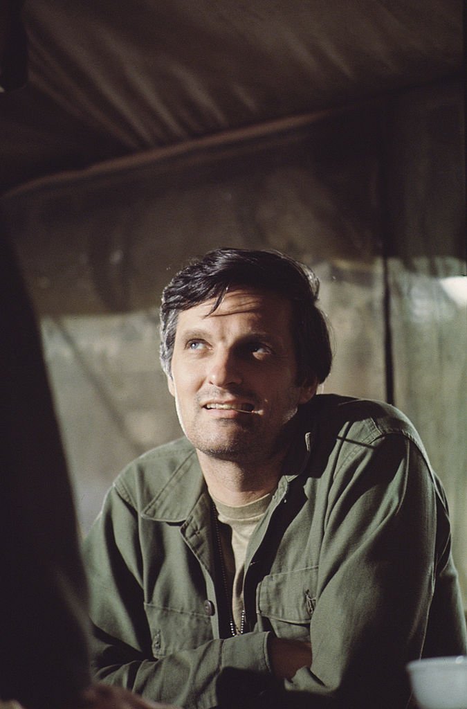 Image Credits: Getty Images / CBS Photo Archive | Alan Alda in costume as Captain Benjamin Pierce in a scene from an episode of the television series 'MASH,' California, 1975