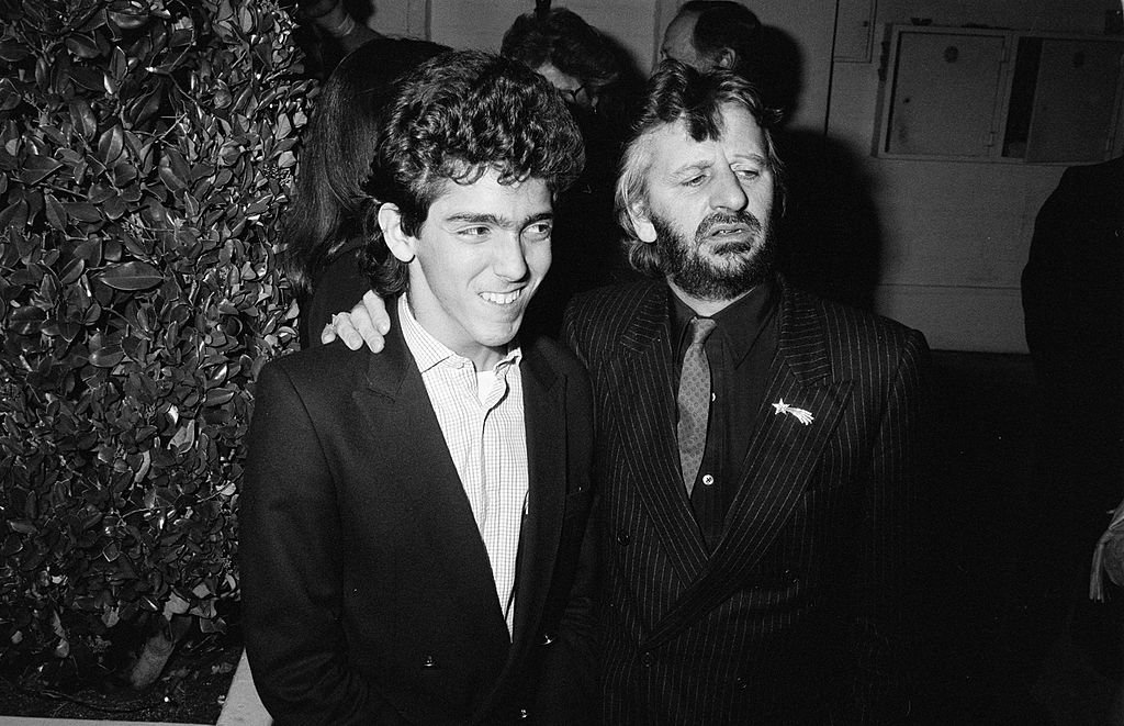 Image Credits: Getty Images / The LIFE Picture Collection | Ringo Starr and stepson Gianni Gregorini. They are at Chasen's restaurant in Beverly Hills.