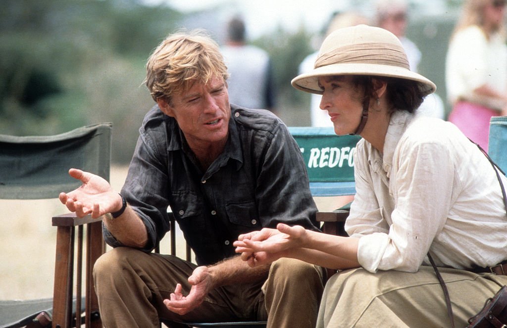 Image Credits: Getty Images / Hemdale | Robert Redford and Meryl Streep during production for the film 'Out Of Africa', 1985.