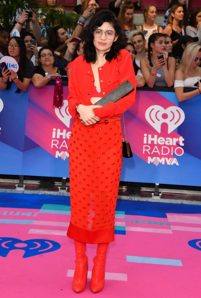 Image Credit: Getty Images / Grimes arrives at the 2017 iHeartRADIO MuchMusic Video Awards at MuchMusic HQ on June 18, 2017 in Toronto, Canada.
