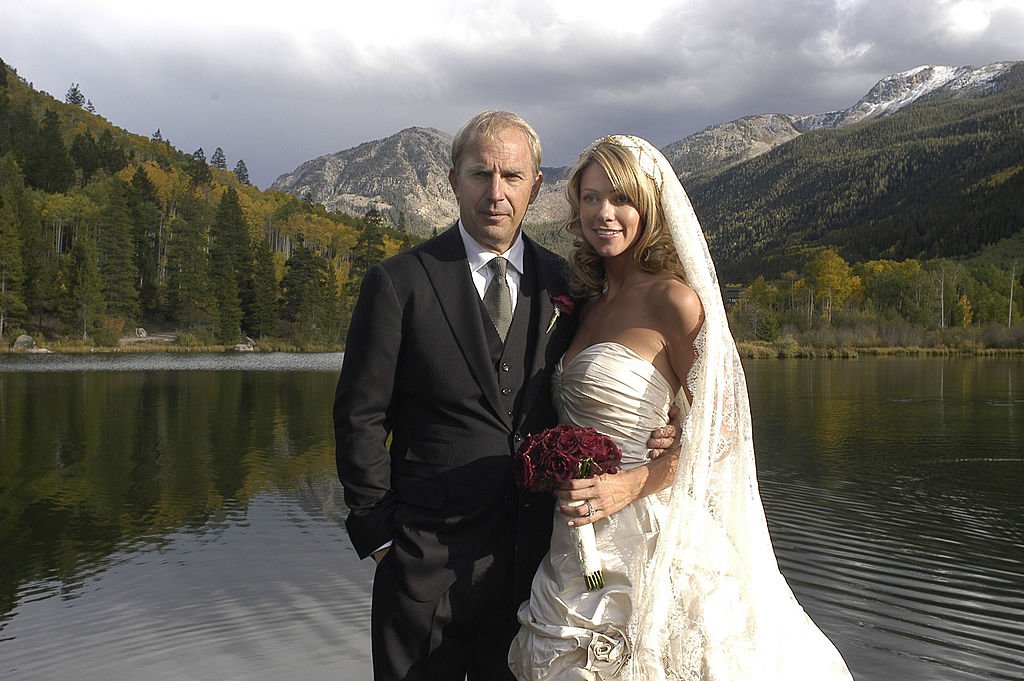 Image Credit: Getty Images / Kevin Costner married his girlfriend of 5 years, Christine Baumgartner at their Aspen, Colorado ranch on September 25, 2004. Image Credit: Getty Images / Kevin Costner married his girlfriend of 5 years, Christine Baumgartner at their Aspen, Colorado ranch on September 25, 2004.