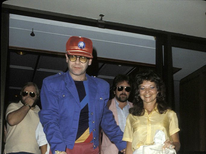 Image Credit: Getty Images / English singer, songwriter, pianist, and composer Elton John with his former wife, Renate in Sydney.