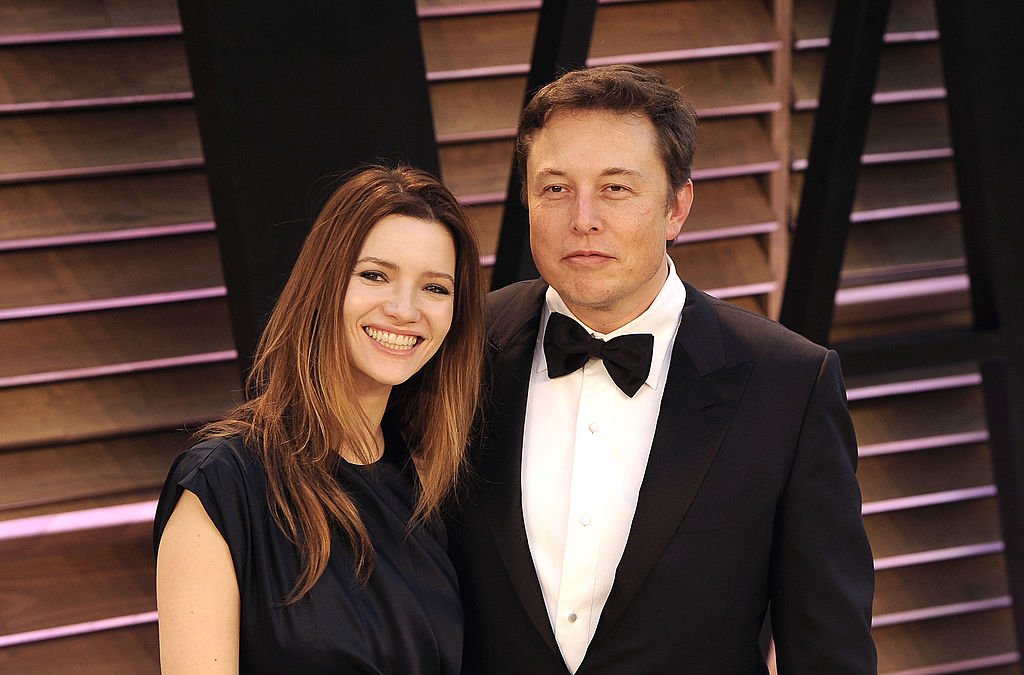 Image Credit: Getty Images / Actress Talulah Riley (L) and CEO of Tesla Motors Elon Musk arrive to the 2014 Vanity Fair Oscar Party on March 2, 2014 in West Hollywood, California.