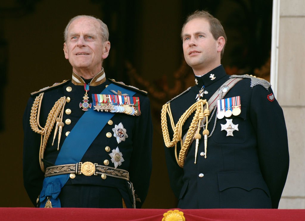 Image Credit: Getty Images / Prince Edward, Earl of Wessex and Prince Philp, Duke of Edinburgh watch the flypast on National Commemoration Day, July 10, 2005, in London.