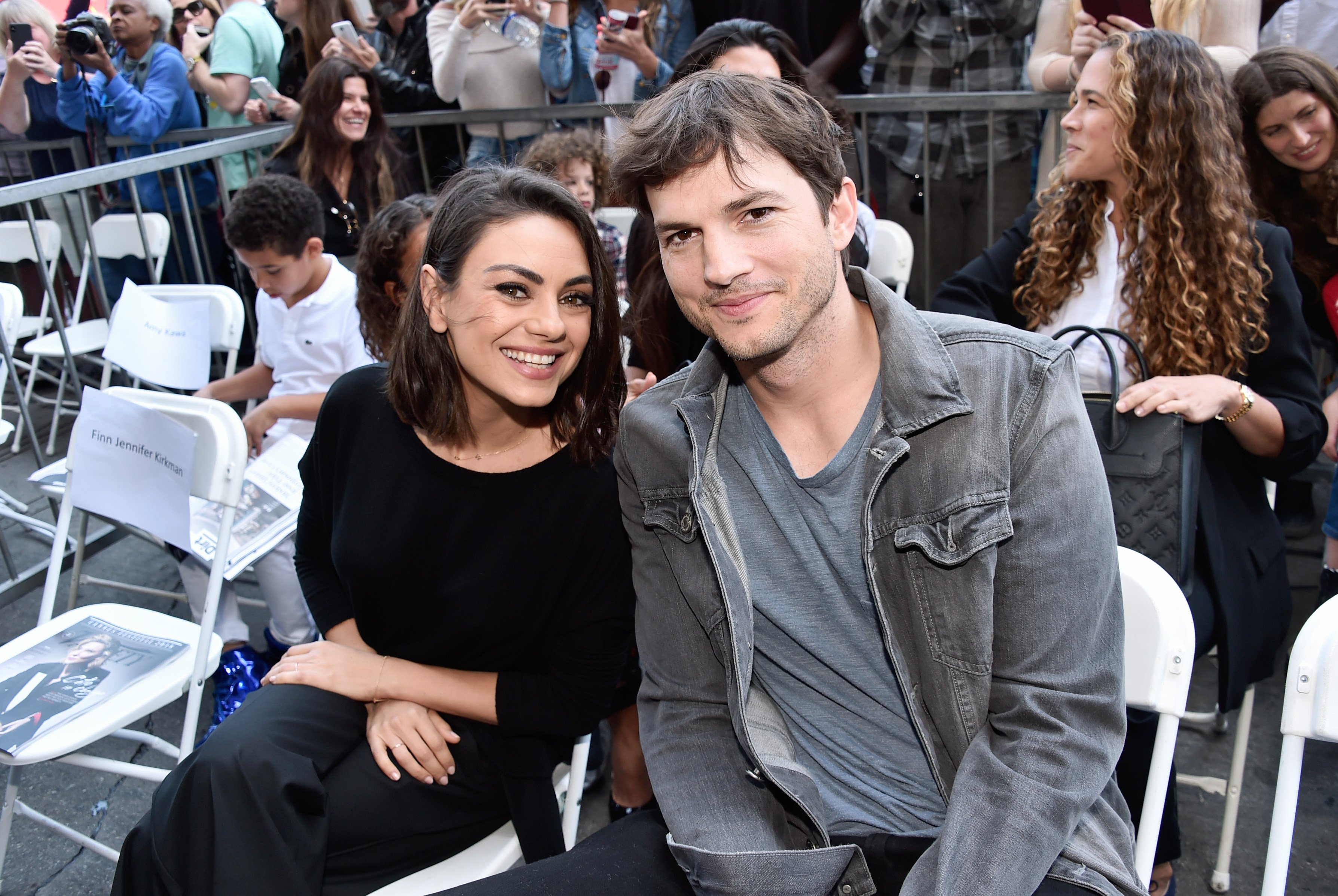 Image Credits: Getty Images / Alberto E. Rodriguez | Actors Mila Kunis (L) and Ashton Kutcher at the Zoe Saldana Walk Of Fame Star Ceremony on May 3, 2018 in Hollywood, California.