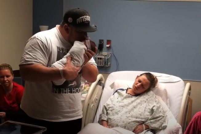 Mother With Newborn Cries When She Sees Under The Blanket