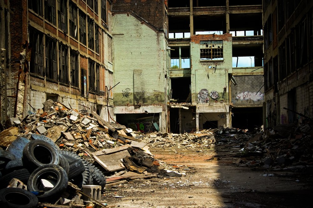 Abandoned Packard factory ruins on a sunny afternoon | Shutterstock Abandoned Packard factory ruins on a sunny afternoon | Shutterstock