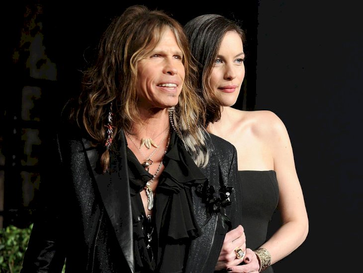 Image Credit: Getty Images / Liv Tyler with her father, Steven Tyler, on the red carpet.
