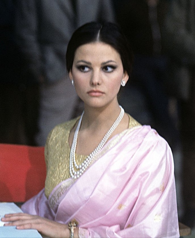 Image Source: Wikimedia Commons| Claudia filming The Pink Panther Image Source: Wikimedia Commons| Claudia filming The Pink Panther