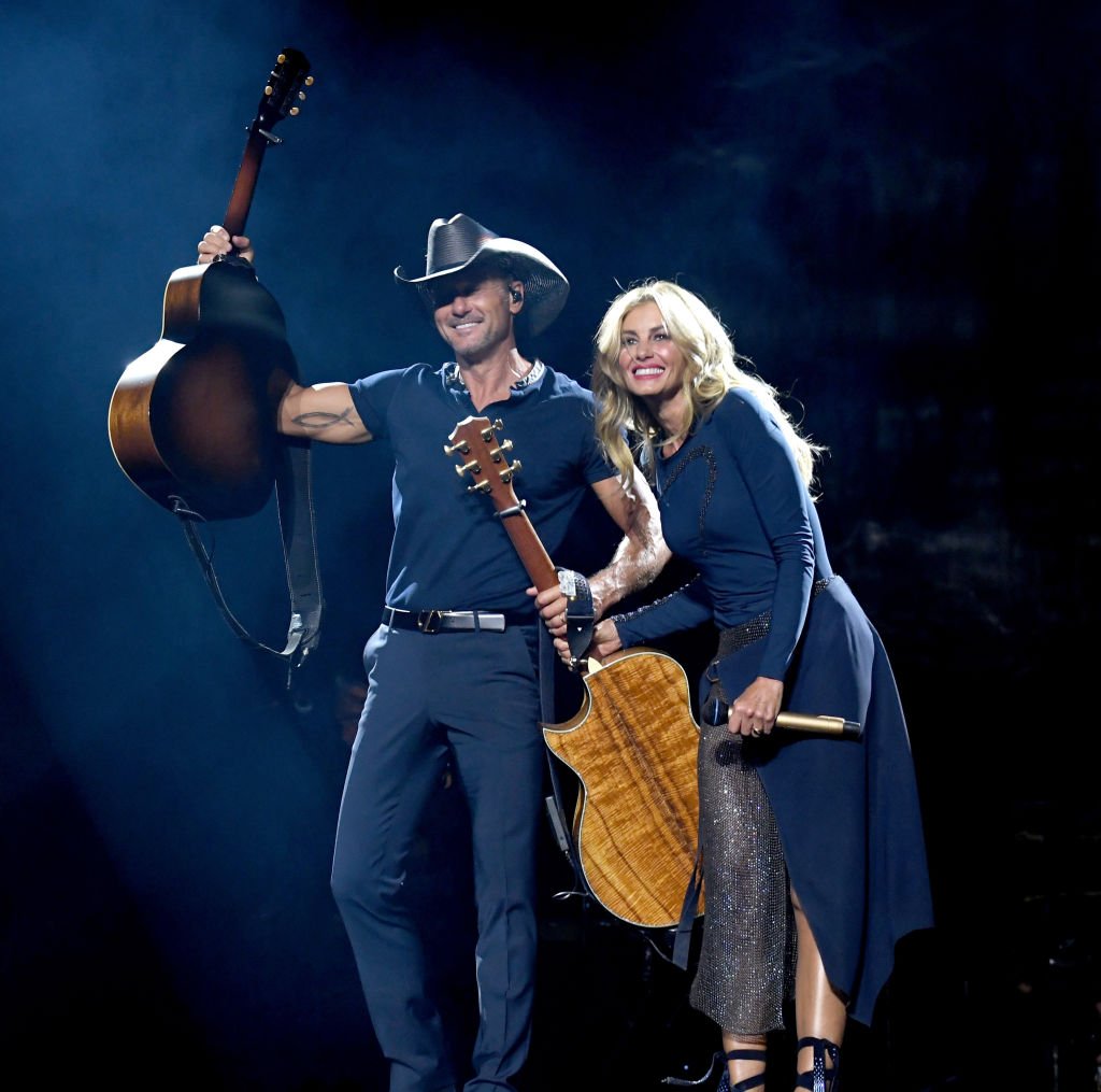 Image Credits: Getty Images / Kevin Winter | Tim McGraw (L) and Faith Hill perform onstage during the "Soul2Soul" World Tour at Staples Center on July 14, 2017 in Los Angeles, California. Image Credits: Getty Images / Kevin Winter | Tim McGraw (L) and Faith Hill perform onstage during the "Soul2Soul" World Tour at Staples Center on July 14, 2017 in Los Angeles, California.