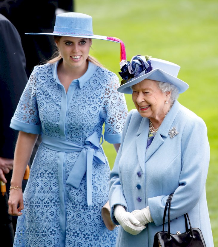 Image Credit: Getty Images / Princess Beatrice at an event with her grandmother, Queen Elizabeth II.