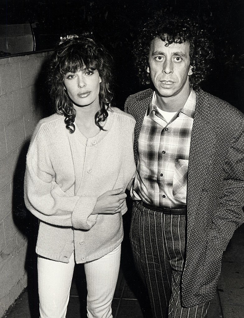 Image Credits: Getty Images / Ron Galella, Ltd. / Ron Galella Collection | Model Kelly LeBrock and husband Victor Drai being photographed on December 17, 1984 at Spago Restaurant in West Hollywood, California. Image Credits: Getty Images / Ron Galella, Ltd. / Ron Galella Collection | Model Kelly LeBrock and husband Victor Drai being photographed on December 17, 1984 at Spago Restaurant in West Hollywood, California.