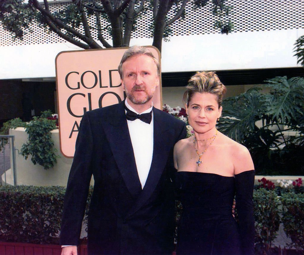 Image Credit: Getty Images / Portrait of married couple, director James Cameron and actress Linda Hamilton, as they pose together at the Beverly Hilton Hotel during the 55th Golden Globe Awards.