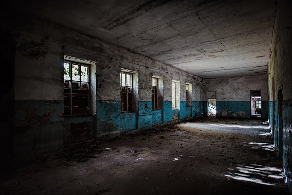 Dark dirty corridor of old abandoned building | Shutterstock Dark dirty corridor of old abandoned building | Shutterstock