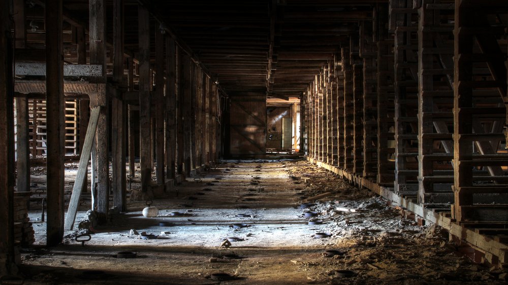 View from old, abandoned brick factory in Southern Finland. Urban exploration. | Shutterstock