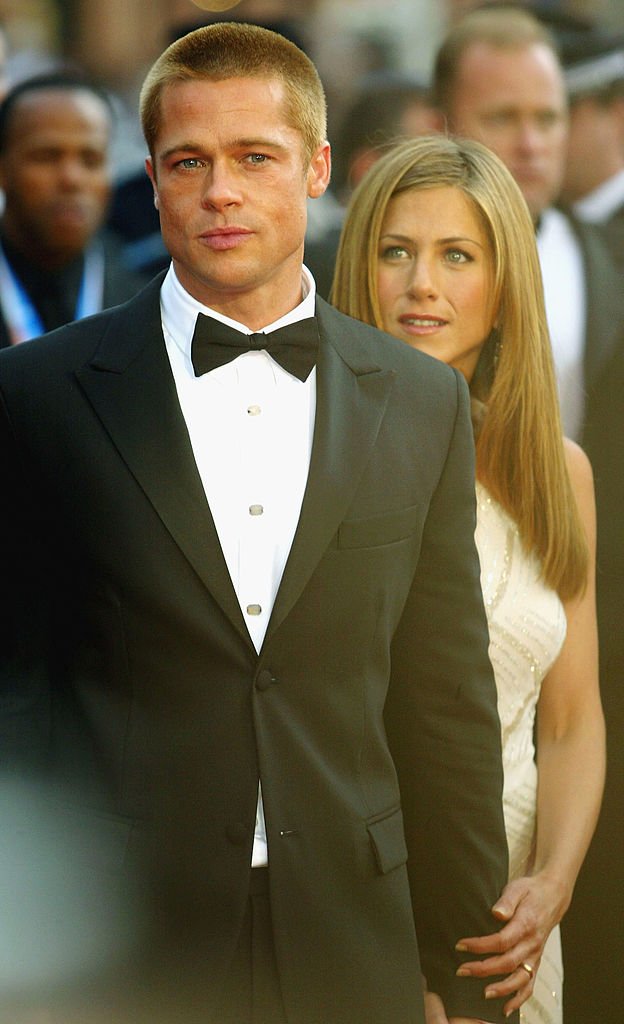 Image Credits: Getty Images / Bruno Vincent | Brad Pitt and Jennifer Aniston attend the World Premiere of epic movie "Troy" at Le Palais de Festival on May 13, 2004 in Cannes, France. Image Credits: Getty Images / Bruno Vincent | Brad Pitt and Jennifer Aniston attend the World Premiere of epic movie "Troy" at Le Palais de Festival on May 13, 2004 in Cannes, France.