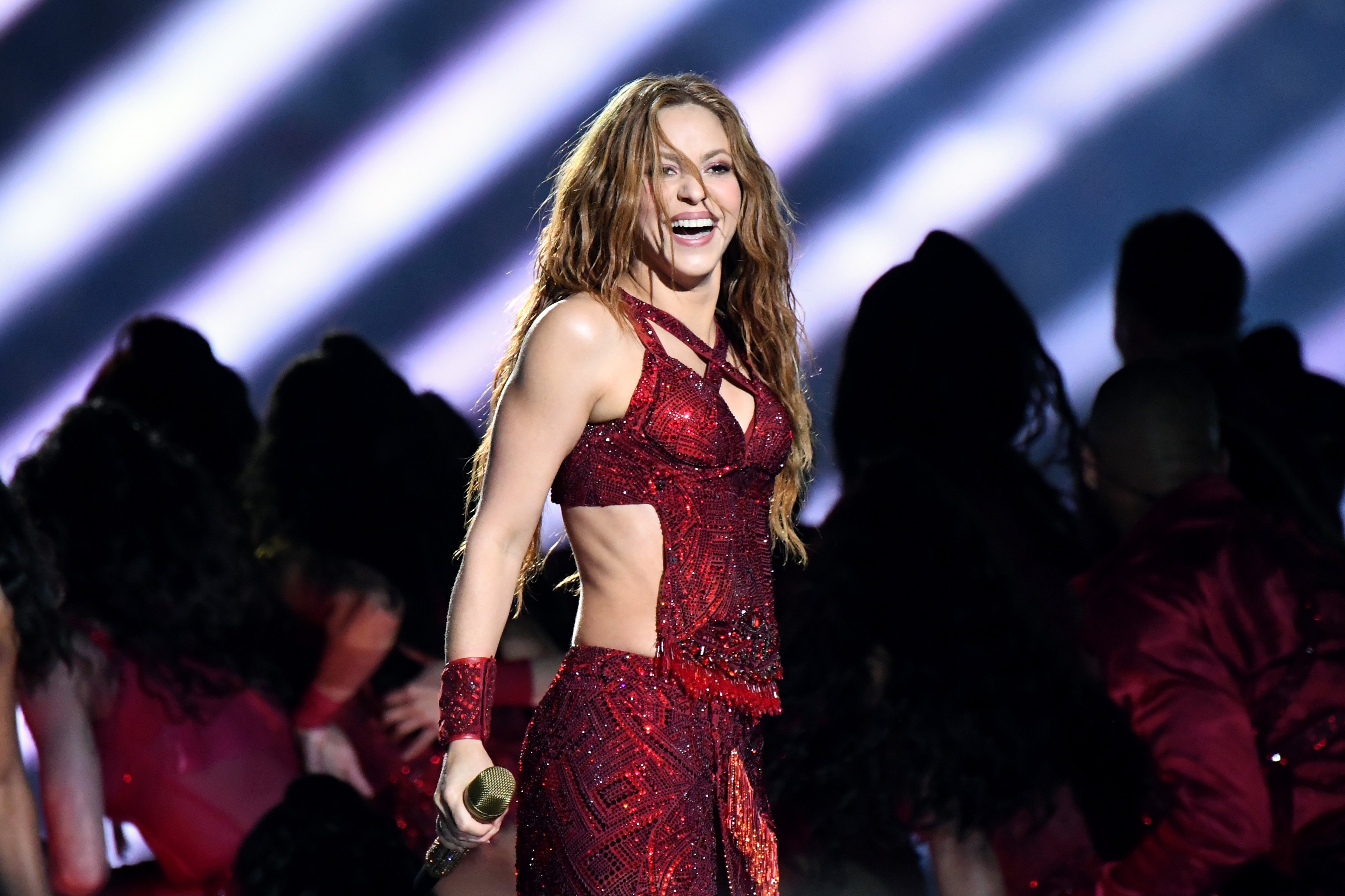 Image Credit: Getty Images / Shakira performing at the Super Bowl LIV Halftime Show.