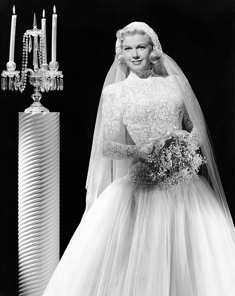Image Credits: Getty Images / George Rinhart / Corbis | (Original Caption) W.B. star and radio lark of the Bob Hope show in a bride's outfit of lace and tulle.