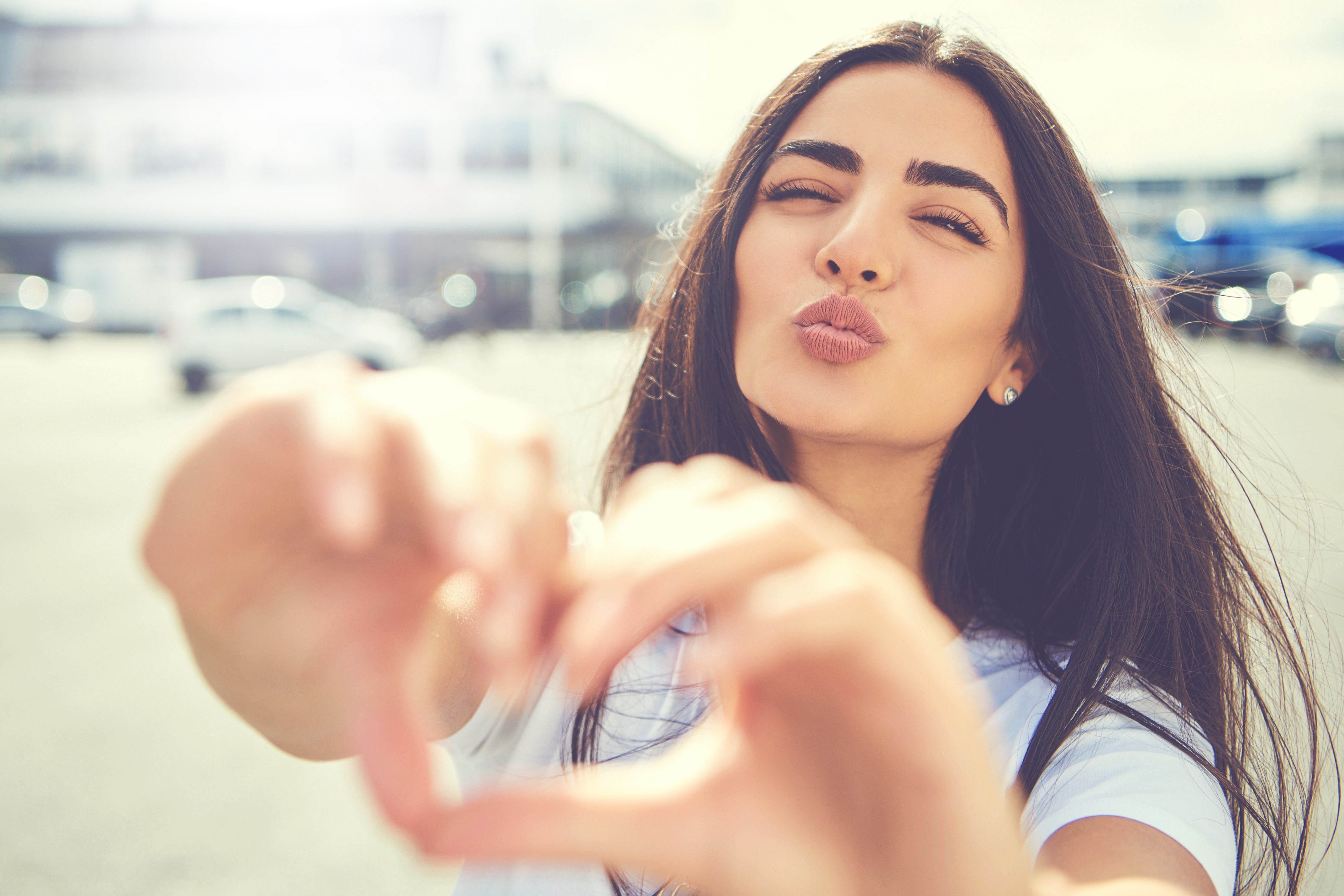 Image credits: Shutterstock / Girl blowing kiss