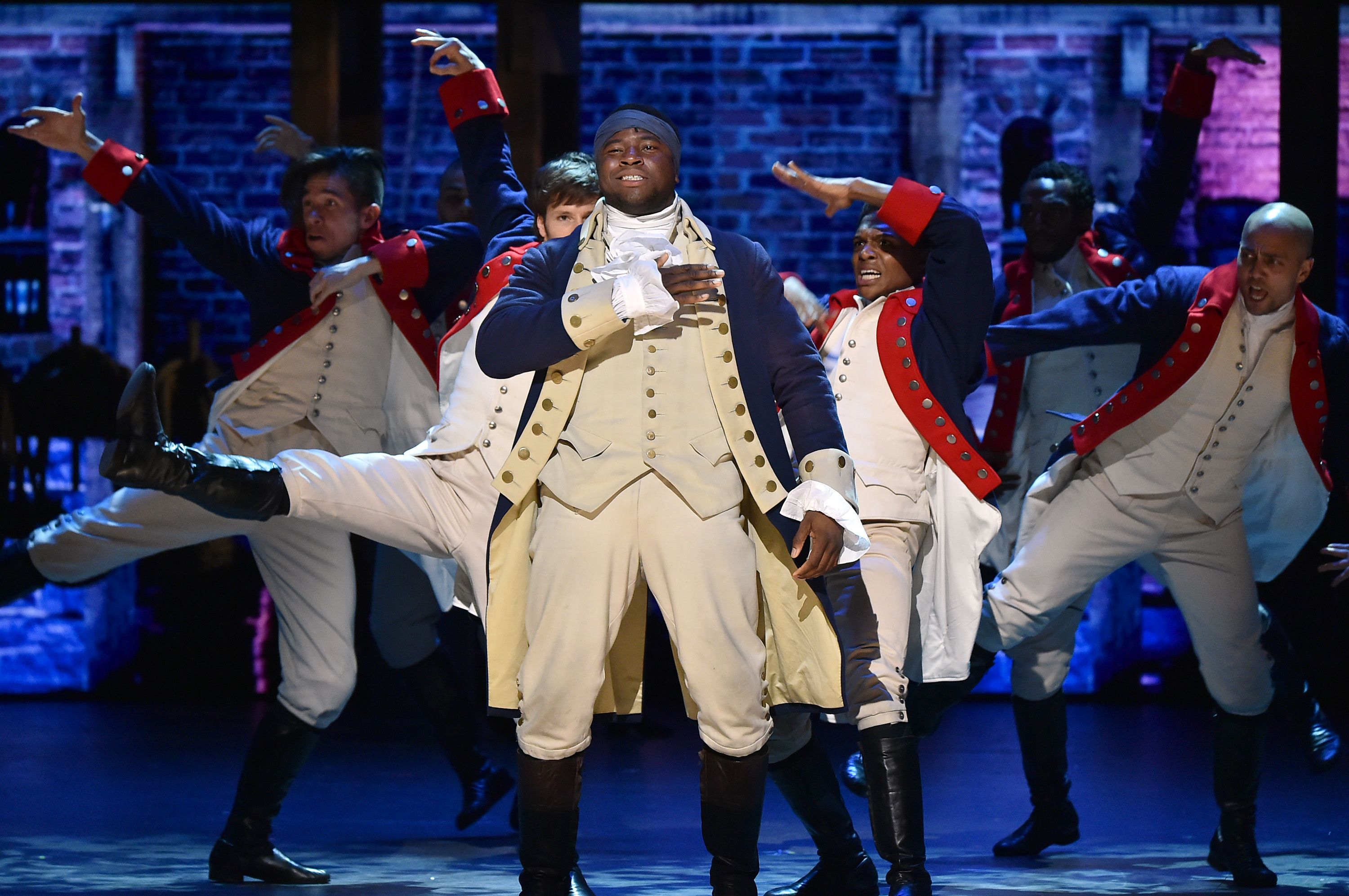 Okieriete Onaodowan and the cast of 'Hamilton' perform onstage during the 70th Annual Tony Awards / Getty Images