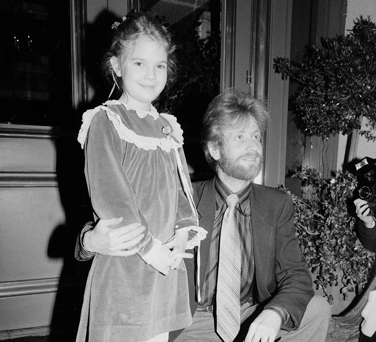 Image Credit: Getty Images/Drew Barrymore with her grandfather