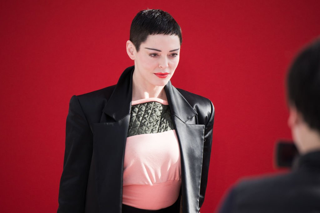 Image Credit: Getty Images / Rose McGowan attends the Vivienne Westwood show as part of the Paris Fashion Week Womenswear Fall/Winter 2018/2019.