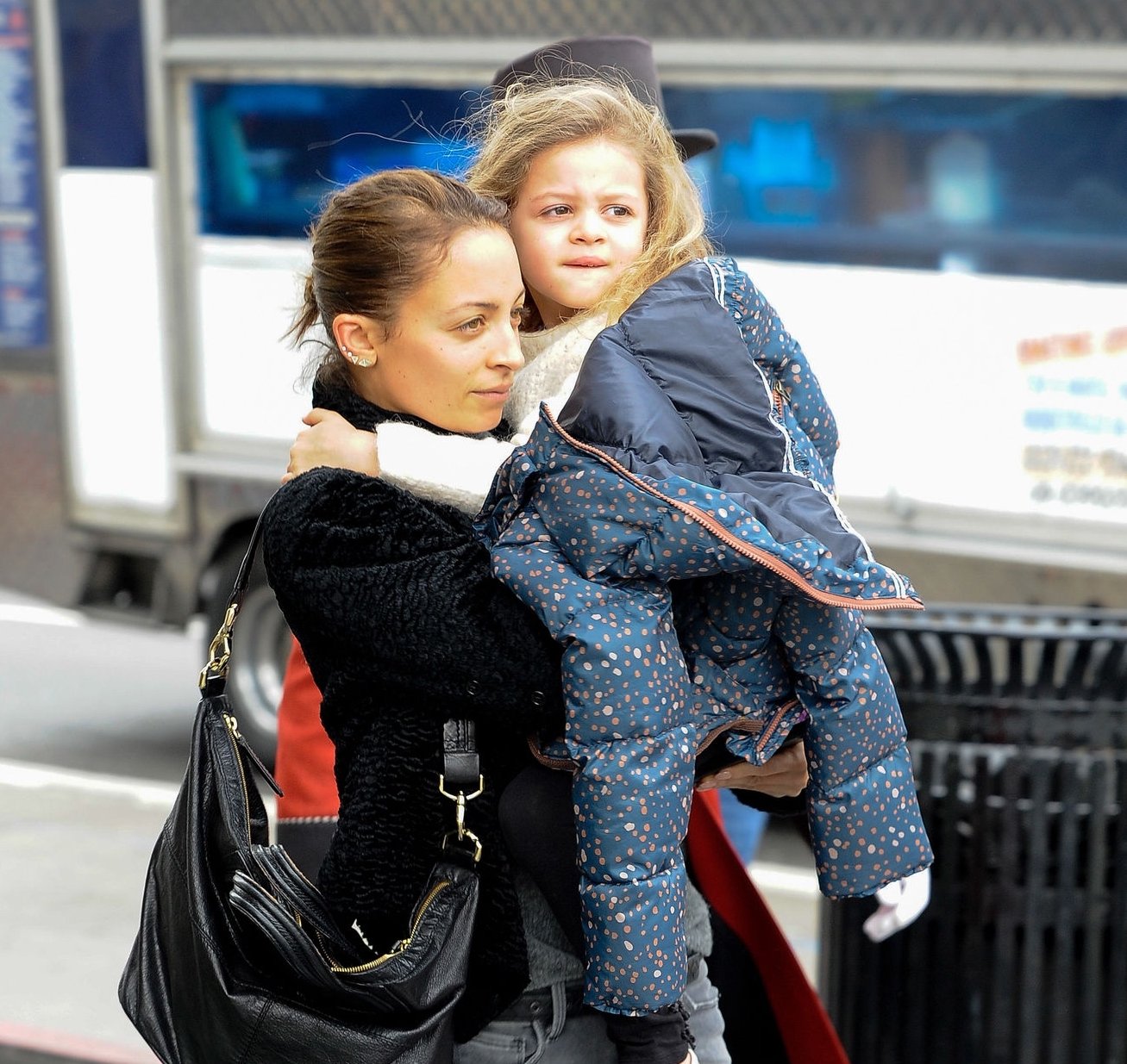 Image Credit: Getty Images/Nicole carrying her daughter