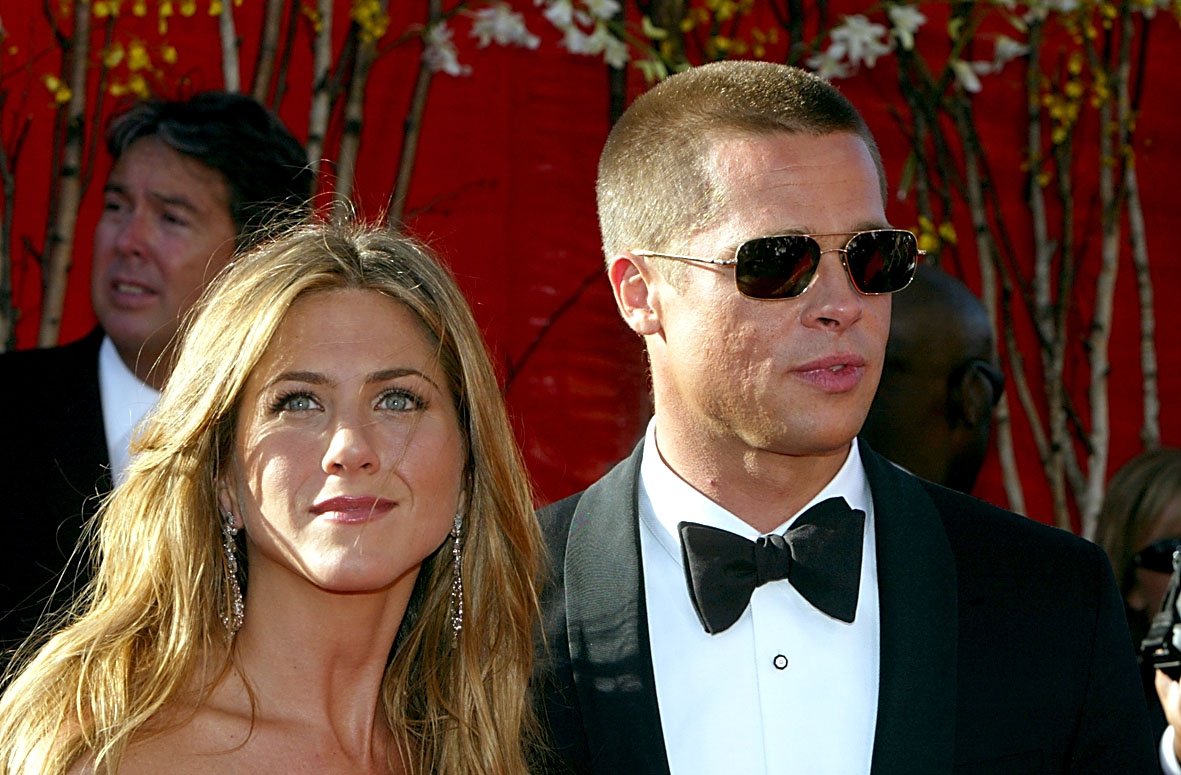 Image Credits: Getty Images / Kevin Winter | Actress Jennifer Aniston and Actor/husband Brad Pitt attend the 56th Annual Primetime Emmy Awards on September 19, 2004 at the Shrine Auditorium, in Los Angeles, California. Image Credits: Getty Images / Kevin Winter | Actress Jennifer Aniston and Actor/husband Brad Pitt attend the 56th Annual Primetime Emmy Awards on September 19, 2004 at the Shrine Auditorium, in Los Angeles, California.
