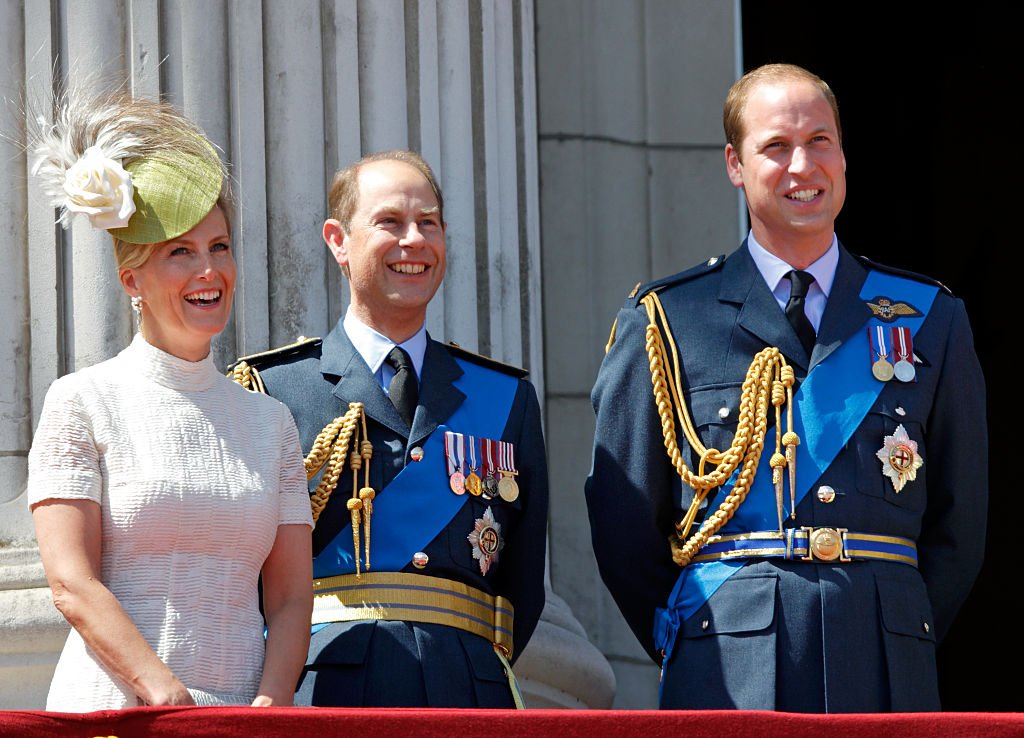 Image Credit: Getty Images / Sophie, Countess of Wessex, Prince Edward, Earl of Wessex and Prince William, Duke of Cambridge watch a flypast from the balcony of Buckingham Palace on July 10, 2015.