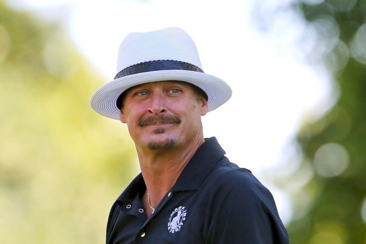 Image Credit: Getty Images/NurPhoto via Getty Images/Amy Lemus | Kid Rock follows during the celebrity shootout of The Ally Challenge