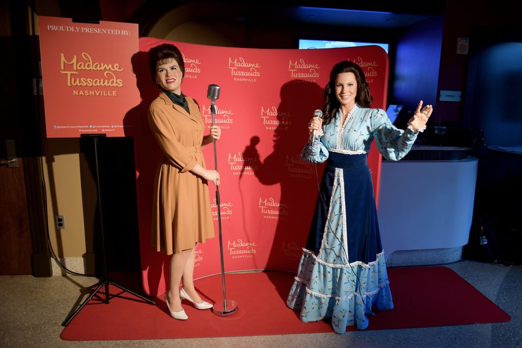 Image Credit: Getty Images / Madame Tussauds' wax figures of Patsy Cline and Loretta Lynn are seen at the Franklin Theatre on October 09, 2019 in Franklin, Tennessee.
