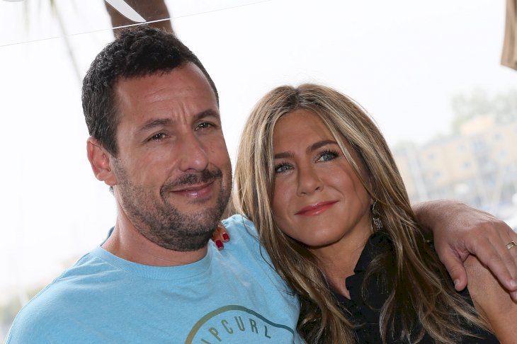 Image Credit: Getty Images/David Livingston | Adam Sandler and Jennifer Aniston during a promotional event for their film, Murder Mystery