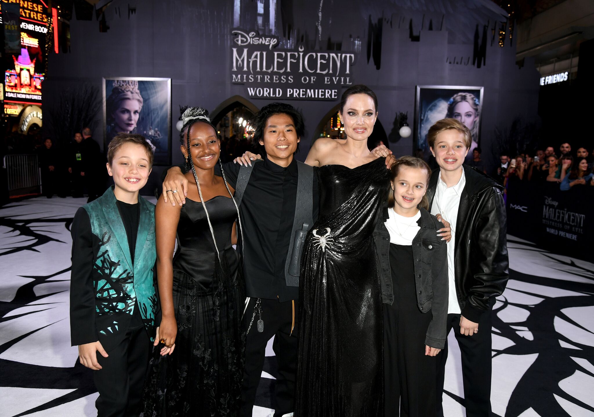 Angelina Jolie with her children at the premiere of Maleficent / Getty Images