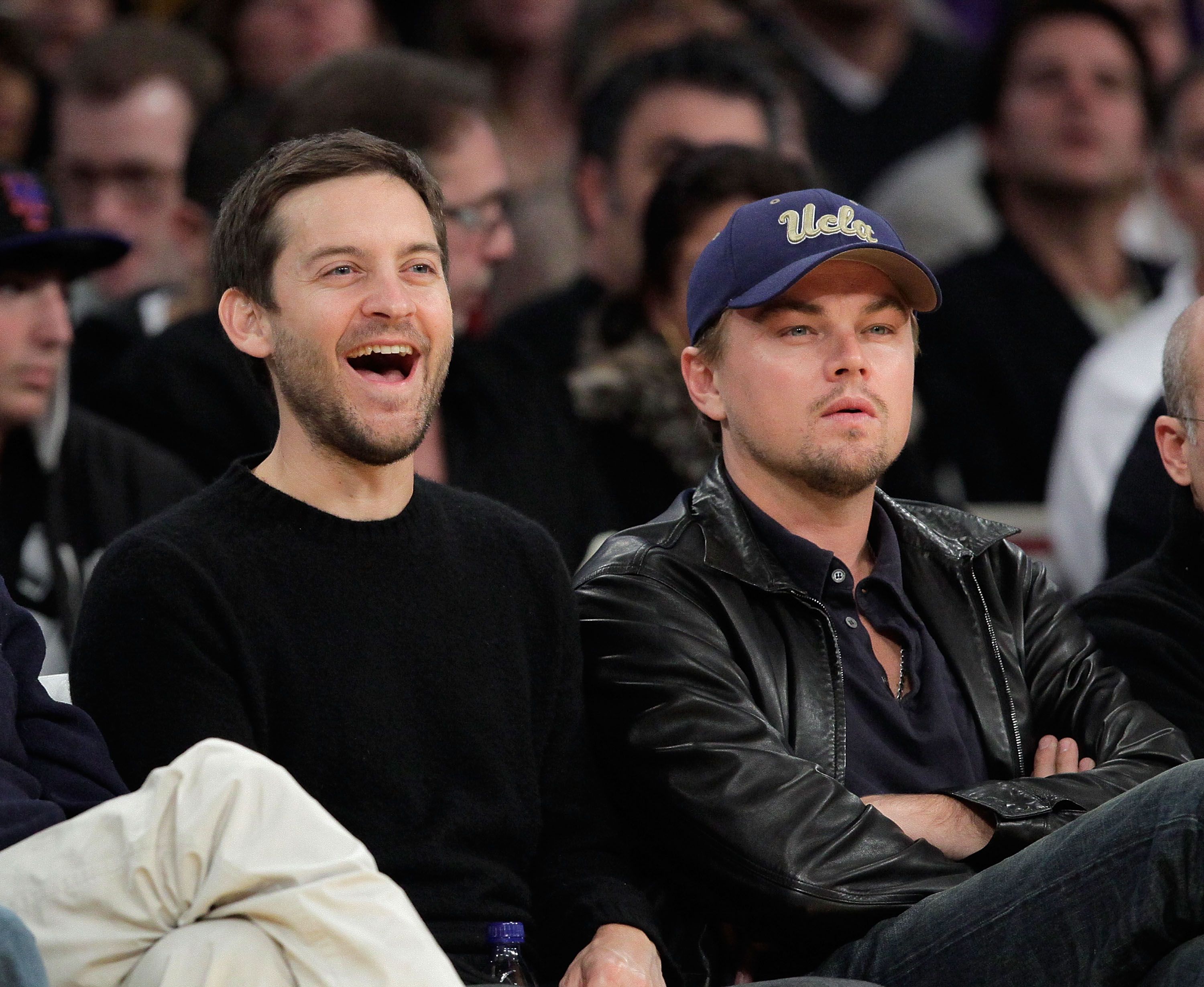Tobey Maguire and Leonardo DiCaprio attend a game between the Oklahoma City Thunder and the Los Angeles Lakers / Getty Images