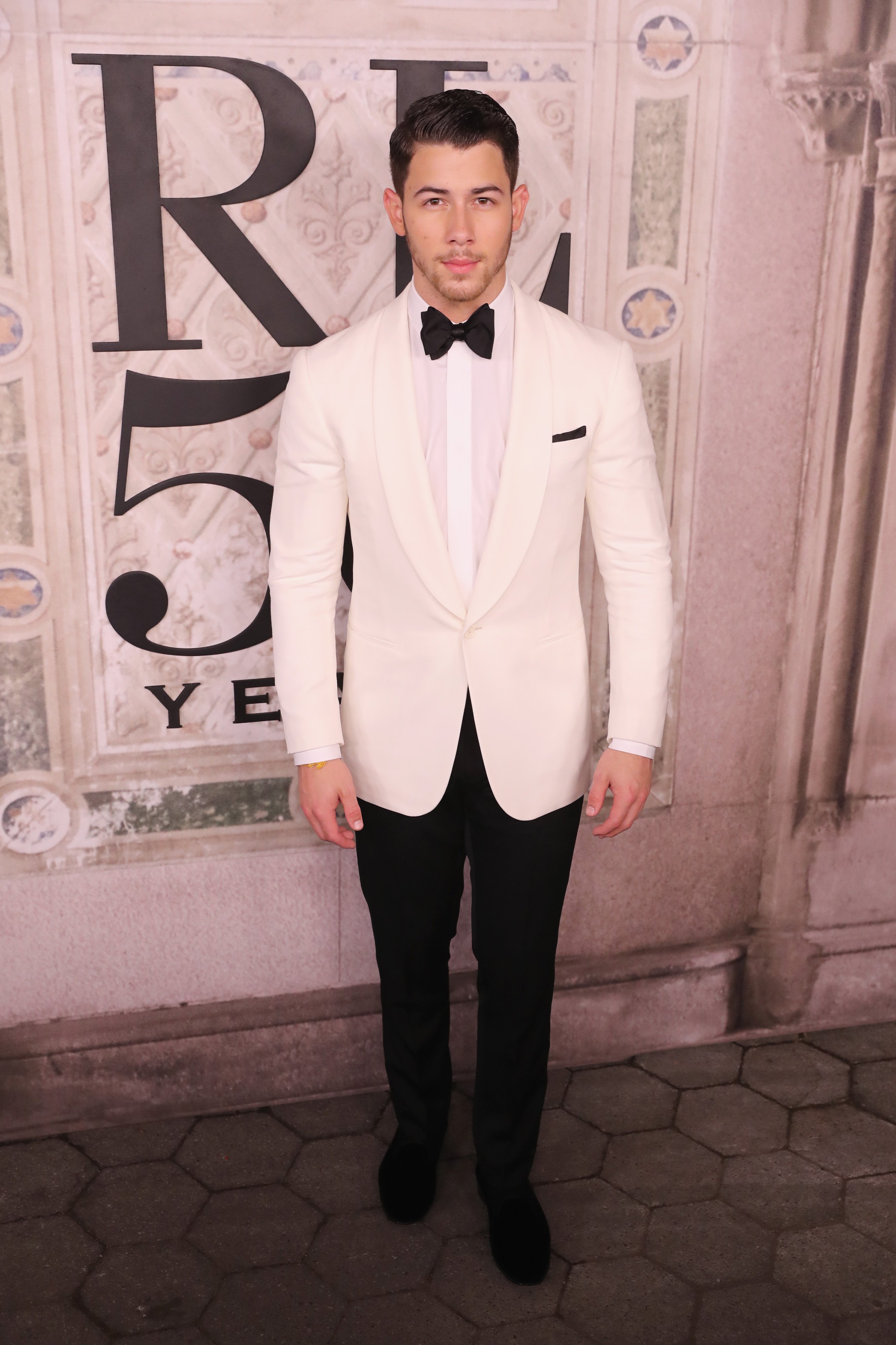 Image Credit: Getty Images/Rob Kim | Nick Jonas attends a Ralph Lauren Event