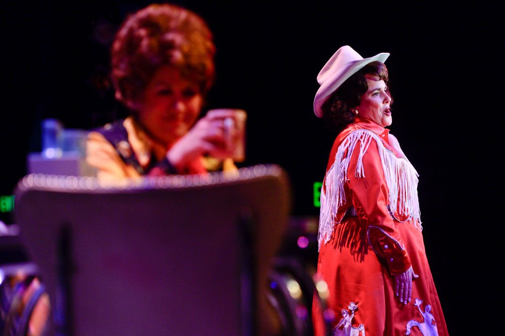 Image Credit: Getty Images / Melissa Swift-Sawyer, playing Patsy Cline during a performance of Always Patsy Cline on Thursday at the Candlelight Dinner Playhouse.