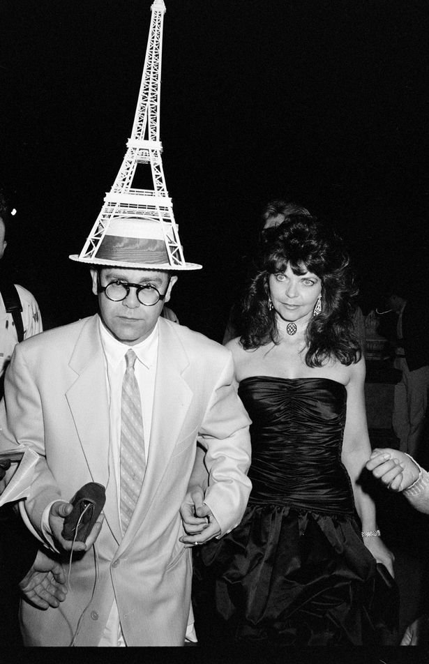 Image Credits: Getty Images / Elton John photographed with his former wife, Renate.