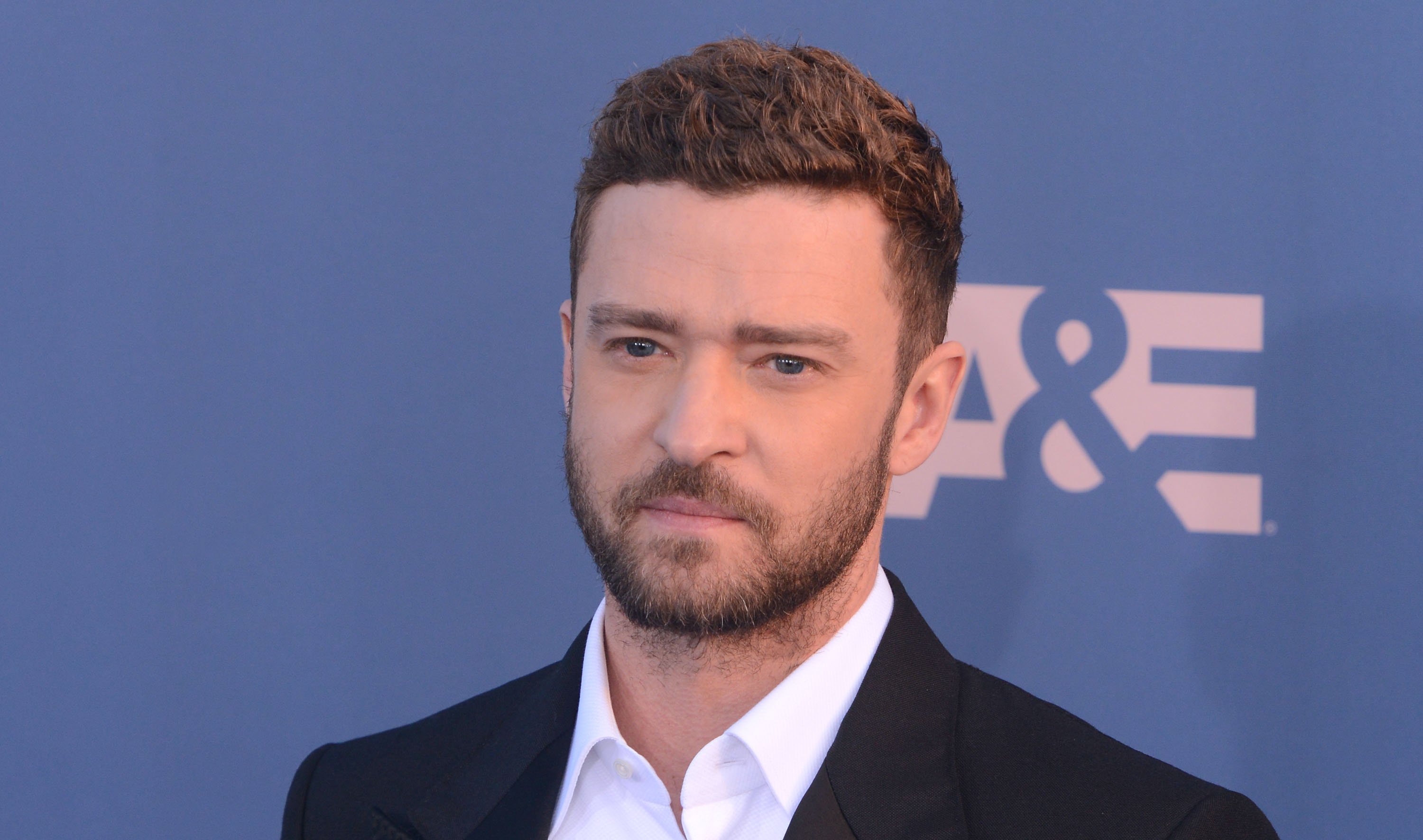 Image Source: Getty Images/Justin at an A&E event